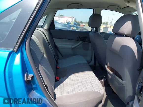 2007 Ford Focus S z VIN 1FAHP34N77W333895, wystawiony jako IAAI lot #42444411 z przebiegiem 155 522 mil mil oraz . Historia ofert i sprzedaży dostępna na DreamBid. Obrazek 8.