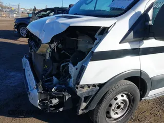 2019 Ford Transit with VIN 1FTYE1YM9KKB70785, listed as a IAAI auction lot 40818143 with 96,199 mi miles. Bid and sale history available at carsss.com. Image 18.
