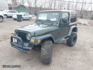2005 Jeep Wrangler X with VIN 1J4FA39S85P308538, listed as a IAAI auction lot 41613121 with 56,196 mi miles. Bid and sale history available at carsss.com. Image 17.