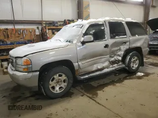 2006 GMC Yukon SLT with VIN 1GKEK13T76J149735, listed as a Copart auction lot 43025715 with 304,493 mi miles and Salvage Title. Bid and sale history available at carsss.com. Image 1.