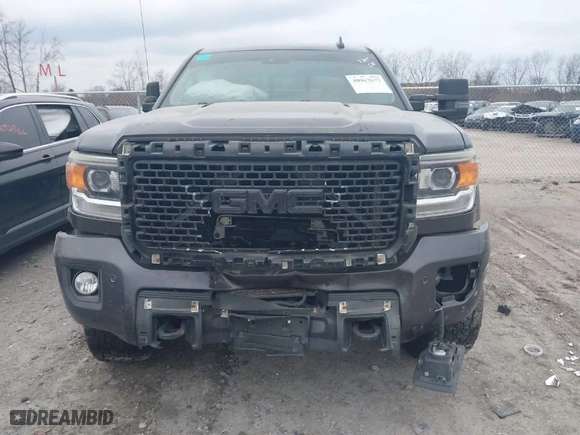 2015 GMC Sierra 2500HD available WiFi Denali with VIN 1GT120E84FF681816, listed as a IAAI auction lot 40967677 with NaN miles. Bid and sale history available at carsss.com. Image 12.
