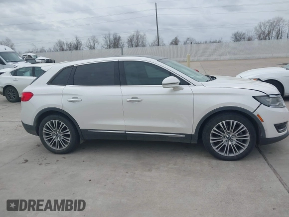 2016 Lincoln MKX Reserve with VIN 2LMPJ6LP8GBL33580, listed as a IAAI auction lot 41749632 with 100,579 mi miles. Bid and sale history available at carsss.com. Image 13.