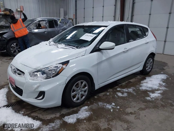 2012 Hyundai Accent GS with VIN KMHCT5AE8CU042470, listed as a IAAI auction lot 41021964 with 94,574 mi miles. Bid and sale history available at carsss.com. Image 2.