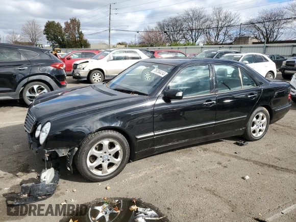 2002 Mercedes-Benz E-Class with VIN WDBJF65J42B471548, listed as a Copart auction lot 79754414 with 200,200 mi miles and Salvage Title. Bid and sale history available at carsss.com. Image 1.
