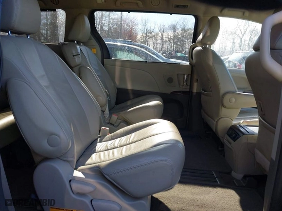 2012 Toyota Sienna XLE AAS with VIN 5TDYK3DC8CS254057, listed as a IAAI auction lot 41853010 with 84,351 mi miles. Bid and sale history available at carsss.com. Image 8.