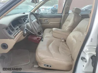1997 Lincoln Town Car Signature with VIN 1LNLM82W2VY697709, listed as a Copart auction lot 70506934 with 200,288 mi miles and Salvage Title. Bid and sale history available at carsss.com. Image 7.