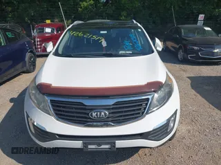 2013 Kia Sportage EX with VIN KNDPCCA22D7363985, listed as a IAAI auction lot 42621519 with 160,029 mi miles and . Bid and sale history available at DreamBid. Image 6.