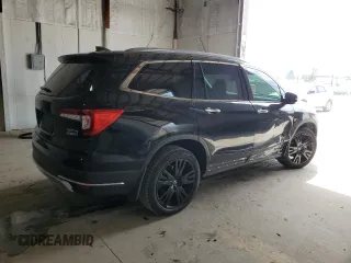 2021 Honda Pilot Touring 8-Passenger with VIN 5FNYF6H97MB062638, listed as a Copart auction lot 50876815 with 49,662 mi miles and Salvage title. Bid and sale history available at DreamBid. Image 3.