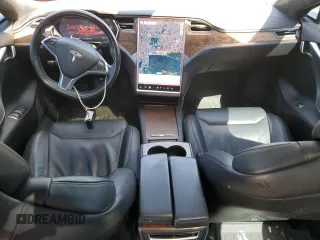 2017 Tesla Model S 100D with VIN 5YJSA1E24HF206828, listed as a Copart auction lot 66004605 with 94,874 mi miles and Salvage title. Bid and sale history available at DreamBid. Image 8.