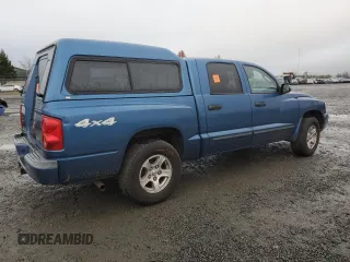 2005 Dodge Dakota Laramie with VIN 1D7HW58N35S225612, listed as a Copart auction lot 83990174 with Not Provided miles and Salvage Title. Bid and sale history available at DreamBid. Image 3.