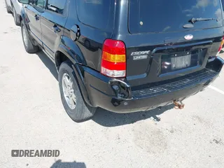 2003 Ford Escape Limited z VIN 1FMCU941X3KB46631, wystawiony jako IAAI lot #42315601 z przebiegiem 202 237 mil mil oraz . Historia ofert i sprzedaży dostępna na DreamBid. Obrazek 6.