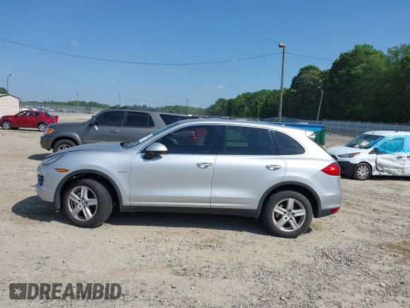 2012 Porsche Cayenne S Hybrid z VIN WP1AE2A20CLA92424, wystawiony jako IAAI lot #42315279 z przebiegiem 129 119 mil mil oraz . Historia ofert i sprzedaży dostępna na DreamBid. Obrazek 14.