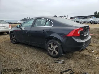 2012 Volvo S60 T5 with VIN YV1622FS7C2140817, listed as a Copart auction lot 89001115 with 97,569 mi miles and Salvage Title. Bid and sale history available at carsss.com. Image 2.