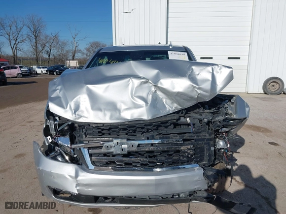 2018 Chevrolet Tahoe Commercial with VIN 1GNSKDEC1JR340887, listed as a IAAI auction lot 41044038 with 99,500 mi miles. Bid and sale history available at carsss.com. Image 12.