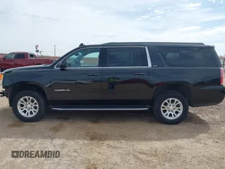 2018 GMC Yukon XL SLT with VIN 1GKS1GKC3JR223544, listed as a IAAI auction lot 41822836 with 164,430 mi miles and . Bid and sale history available at carsss.com. Image 15.