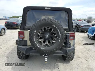 2017 Jeep Wrangler Unlimited Sport with VIN 1C4BJWDG5HL670282, listed as a Copart auction lot 52332905 with 106,022 mi miles and Salvage Title. Bid and sale history available at carsss.com. Image 6.