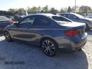 2021 BMW 2 Series 230i with VIN WBA2J1C01M7G97702, listed as a Copart auction lot 75096704 with 29,884 mi miles and Salvage Title. Bid and sale history available at carsss.com. Image 2.