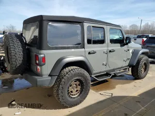 2023 Jeep Wrangler Sport S with VIN 1C4HJXDG8PW675134, listed as a Copart auction lot 85949314 with 19,128 mi miles and Salvage Title. Bid and sale history available at DreamBid. Image 3.