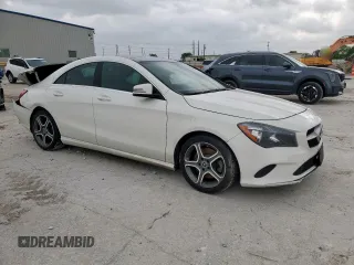 2018 Mercedes-Benz CLA 250 with VIN WDDSJ4GB1JN555893, listed as a Copart auction lot 54505525 with 81,945 mi miles and Salvage Title. Bid and sale history available at DreamBid. Image 4.