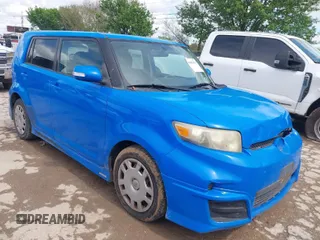 2011 Scion xB with VIN JTLZE4FE2B1134173, listed as a IAAI auction lot 41882079 with 223,149 mi miles. Bid and sale history available at carsss.com. Image 1.