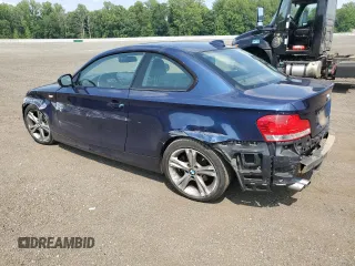 2011 BMW 1 Series 128i with VIN WBAUP7C57BVP21318, listed as a Copart auction lot 60479055 with 102,151 mi miles and Salvage title. Bid and sale history available at DreamBid. Image 2.