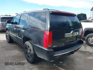 2011 Cadillac Escalade Premium z VIN 1GYS4CEF4BR143330, wystawiony jako IAAI lot #42305822 z przebiegiem 282 752 mil mil oraz . Historia ofert i sprzedaży dostępna na DreamBid. Obrazek 3.