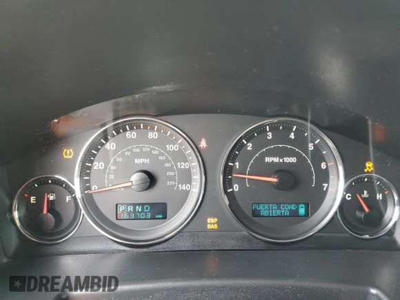 2006 Jeep Commander with VIN 1J8HH48N06C352871, listed as a Copart auction lot 87740115 with 163,703 mi miles and Salvage Title. Bid and sale history available at carsss.com. Image 9.