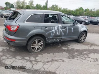 2014 Audi Q7 Premium Plus with VIN WA1LGAFE8ED014210, listed as a IAAI auction lot 42176663 with 101,557 mi miles and . Bid and sale history available at DreamBid. Image 4.