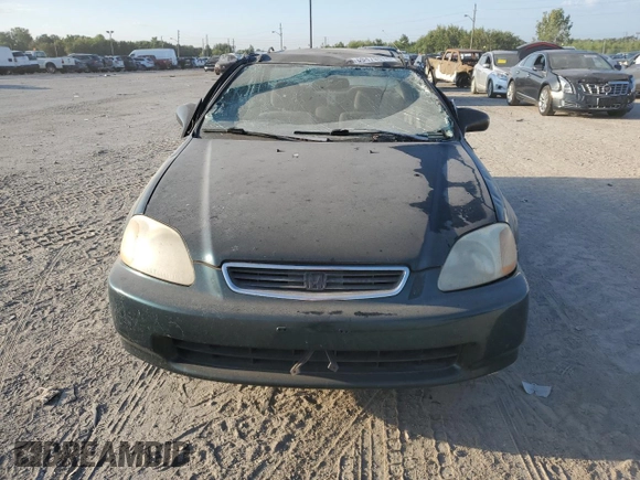 1997 Honda Civic LX with VIN 1HGEJ6570VL028030, listed as a Copart auction lot 69479674 with 160,958 mi miles and Salvage Title. Bid and sale history available at carsss.com. Image 5.
