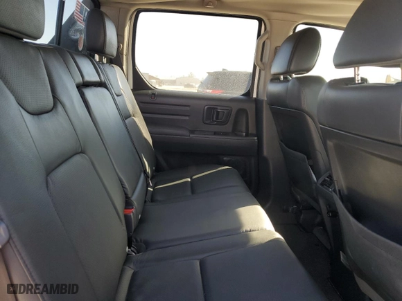 2014 Honda Ridgeline SE with VIN 5FPYK1F62EB010382, listed as a Copart auction lot 49889335 with 94,939 mi miles and Salvage Title. Bid and sale history available at carsss.com. Image 10.
