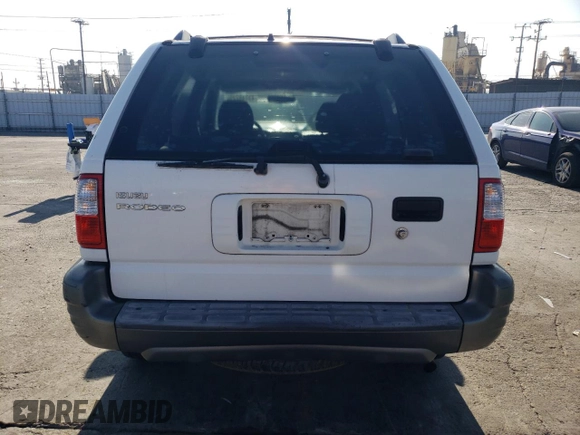 2001 Isuzu Rodeo S with VIN 4S2CK58W914331185, listed as a Copart auction lot 43748225 with 138,882 mi miles and Salvage Title. Bid and sale history available at DreamBid. Image 6.
