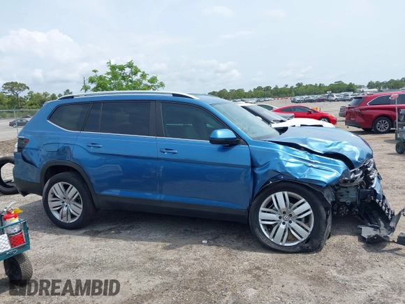 2019 Volkswagen Atlas SE z VIN 1V2WR2CA5KC524650, wystawiony jako IAAI lot #42217791 z przebiegiem 92 571 mil mil oraz . Historia ofert i sprzedaży dostępna na DreamBid. Obrazek 12.