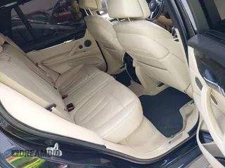 2014 BMW X5 xDrive50i with VIN 5UXKR6C55E0C03743, listed as a IAAI auction lot 42268302 with 118,892 mi miles and . Bid and sale history available at DreamBid. Image 8.