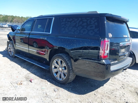 2016 GMC Yukon XL Denali with VIN 1GKS1HKJ5GR435925, listed as a IAAI auction lot 41727259 with 137,098 mi miles. Bid and sale history available at carsss.com. Image 3.