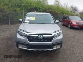2020 Honda Ridgeline RTL-E with VIN 5FPYK3F73LB004365, listed as a IAAI auction lot 41965887 with 80,981 mi miles and . Bid and sale history available at DreamBid. Image 12.