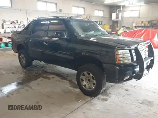 2005 Cadillac Escalade EXT z VIN 3GYEK62N55G153966, wystawiony jako IAAI lot #42310541 z przebiegiem Nie podano mil oraz . Historia ofert i sprzedaży dostępna na DreamBid. Obrazek 1.