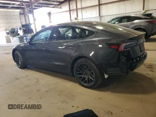 2025 Tesla Model 3 Long Range with VIN 5YJ3E1EB3SF904881, listed as a Copart auction lot 52704205 with 1,904 mi miles and Salvage Title. Bid and sale history available at DreamBid. Image 2.