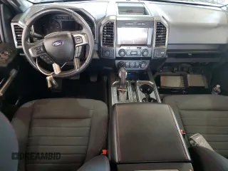 2020 Ford F-150 XL with VIN 1FTEW1E44LFC02735, listed as a Copart auction lot 62062125 with 111,471 mi miles and Salvage title. Bid and sale history available at DreamBid. Image 8.