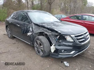 2013 Honda Crosstour EX-L z VIN 5J6TF2H52DL005786, wystawiony jako IAAI lot #42076956 z przebiegiem 87 191 mil mil oraz . Historia ofert i sprzedaży dostępna na DreamBid. Obrazek 1.