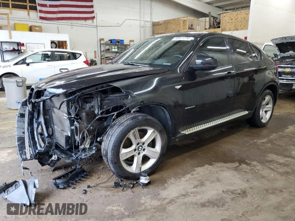 2014 BMW X6 xDrive35i with VIN 5UXFG2C56E0H10070, listed as a Copart auction lot 55911774 with 122,278 mi miles and Salvage Title. Bid and sale history available at carsss.com. Image 1.