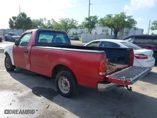 1999 Ford F-150 Work Series with VIN 1FTZF1727XKA70063, listed as a IAAI auction lot 41948032 with 134,642 mi miles. Bid and sale history available at carsss.com. Image 3.