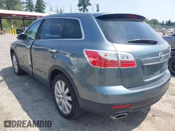 2010 Mazda CX-9 Touring z VIN JM3TB3MV5A0220905, wystawiony jako IAAI lot #42566018 z przebiegiem 158 152 mil mil oraz . Historia ofert i sprzedaży dostępna na DreamBid. Obrazek 3.