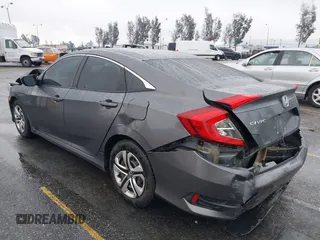 2017 Honda Civic Sedan LX with VIN 19XFC2F68HE212205, listed as a IAAI auction lot 41527843 with 128,401 mi miles. Bid and sale history available at carsss.com. Image 3.