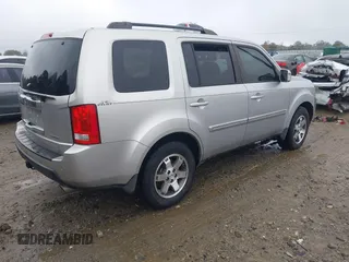 2010 Honda Pilot Touring with VIN 5FNYF3H89AB005861, listed as a IAAI auction lot 40828747 with 275,757 mi miles and . Bid and sale history available at DreamBid. Image 4.