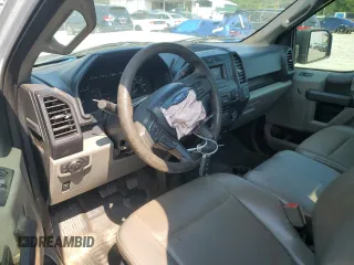 2018 Ford F-150 XL с VIN 1FTMF1CBXJKF62402, выставлен на аукционе Copart как лот 63579525 с пробегом 54 987 миль миль и Списание • Salvage title. История ставок и продаж доступна на DreamBid. Изображение 8.