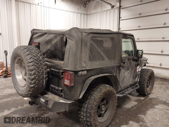 2007 Jeep Wrangler X with VIN 1J4FA24117L126599, listed as a IAAI auction lot 41624453 with 86,963 mi miles and . Bid and sale history available at carsss.com. Image 4.