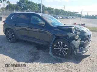 2023 Mazda CX-50 S Premium Plus with VIN 7MMVABEM1PN141344, listed as a IAAI auction lot 41473823 with 12,120 mi miles and . Bid and sale history available at DreamBid. Image 1.