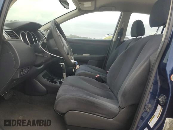 2009 Nissan Versa 1.8 S with VIN 3N1BC11E49L500200, listed as a Copart auction lot 87227464 with 215,170 mi miles and Salvage Title. Bid and sale history available at carsss.com. Image 7.