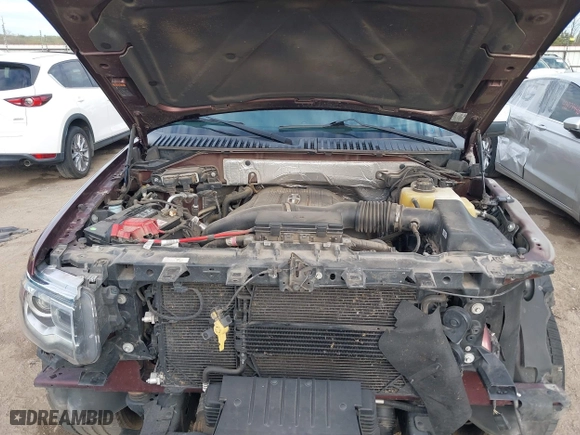 2015 Lincoln Navigator with VIN 5LMJJ2JT4FEJ12021, listed as a IAAI auction lot 41880471 with 104,979 mi miles. Bid and sale history available at carsss.com. Image 10.