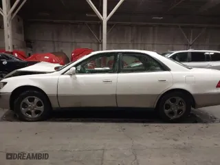 1997 Lexus ES 300 Luxury Sport Sdn with VIN JT8BF22G4V0049902, listed as a IAAI auction lot 41579727 with 1 mi miles. Bid and sale history available at carsss.com. Image 14.